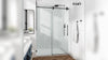 Matte black frameless shower door in a modern bathroom