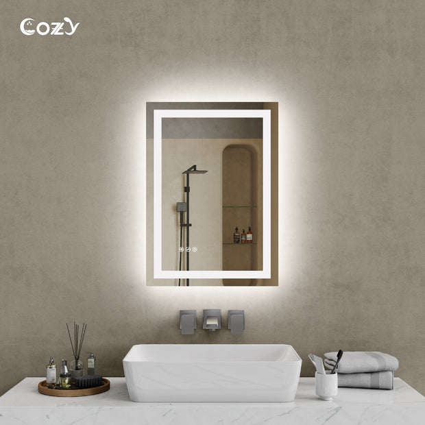 Cozy 20x28 inch backlit and front-lit LED bathroom vanity mirror in a modern setting.