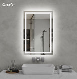 Cozy 24x36 inch backlit and front-lit LED bathroom vanity mirror in a modern setting