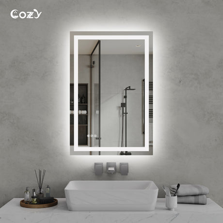 Cozy 24x36 inch backlit and front-lit LED bathroom vanity mirror in a modern setting