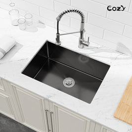 Top-down perspective of Cozy 27-inch matte black undermount single bowl handmade kitchen sink integrated with white countertop