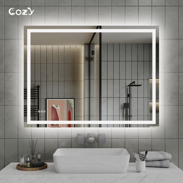 Cozy 48x36 inch backlit and front-lit LED bathroom vanity mirror in a modern setting.