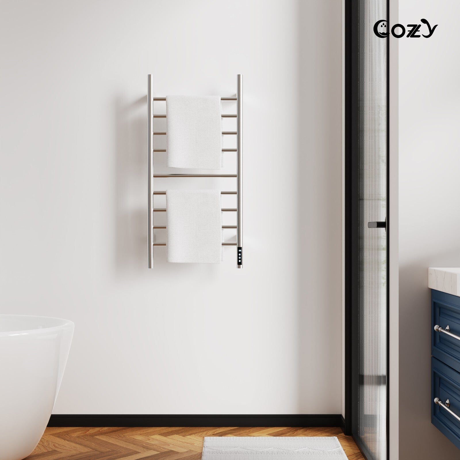 Cozy EB03 electric heated towel rack in brushed nickel installed in a modern bathroom.