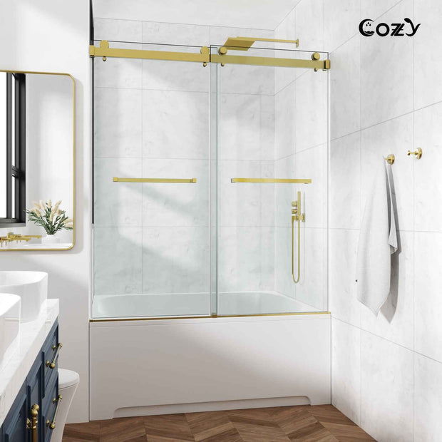 Cozy GD09-6060 Brushed Gold frameless double sliding tub door installed over a bathtub in a modern bathroom.