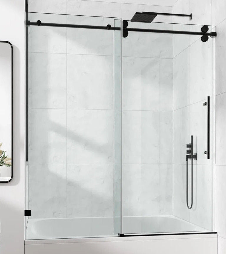 Cozy GD10-4860 Matte Black frameless single sliding tub door installed over a bathtub in a modern bathroom.