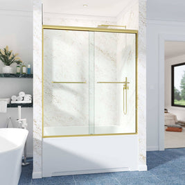 Cozy GD15 Brushed Gold semi-frameless double sliding tub door installed above a bathtub in a bright tiled bathroom.